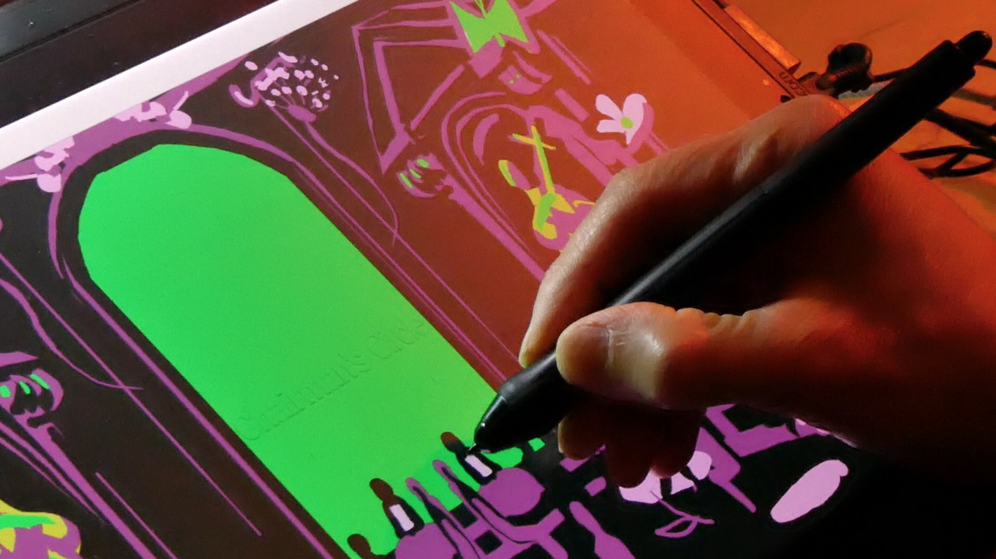 Artiste au travail sur tablette graphique pendant une performance de digital live show